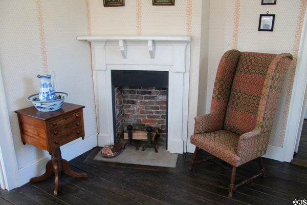 Locally made wing chair beside bedroom fireplace at Craik-Patton House. Charleston, WV.