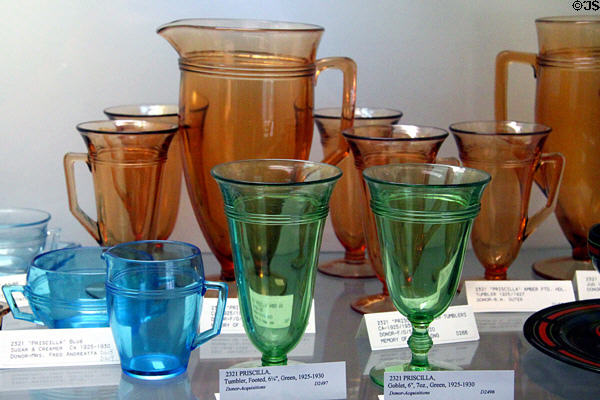 Blue, amber & green Priscilla pattern (1925-30) glass cups, tumblers & pitchers at Fostoria Glass Museum. Moundsville, WV.
