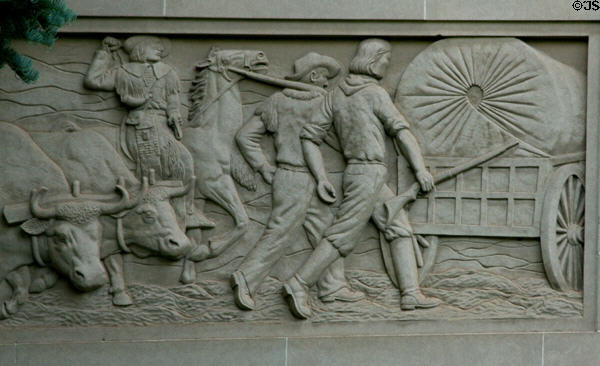 Oxen-drawn wagon relief on Wyoming Supreme Court & State Library Building. Cheyenne, WY.