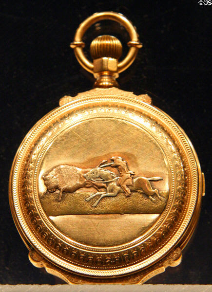 Gold repeater watch engraved with Cody hunting Buffalo by Leopold Haguenin (c1890) given to Cody possibly by Prince of Wales at Buffalo Bill Center of the West. Cody, WY.