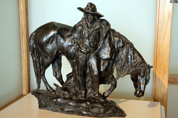 Evening sculpture of cowboy with horse (1905) by Solon H. Borglum at Buffalo Bill Center of the West. Cody, WY.