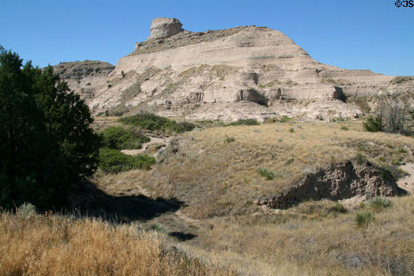 Original Oregon Trail ruts wind between obstacles at Scotts Bluff National Monument. WY.