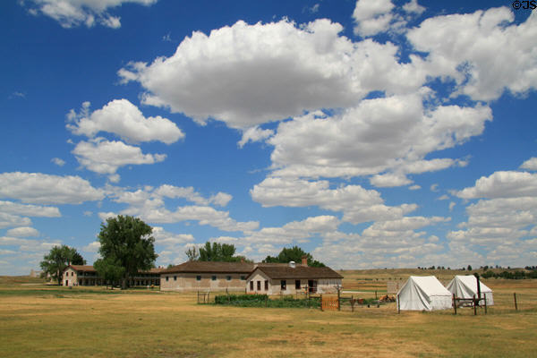 Cavalry barracks & outbuildings sit on prairie landscape of un-stockaded Fort Laramie National Historic Site. WY.