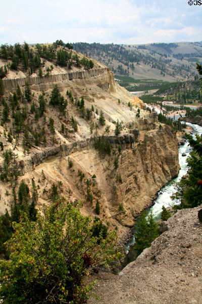 Yellowstone River near Tower Fall with two thick layers of volcanic deposits evident in Yellowstone National Park. WY.