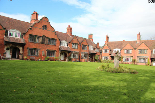 Cluster of Lever factory housing in park setting at Port Sunlight. Liverpool, England.