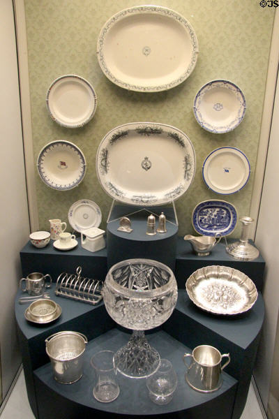 Collection of dining & serving pieces from various shipping lines sailing out of Liverpool at Merseyside Maritime Museum. Liverpool, England.