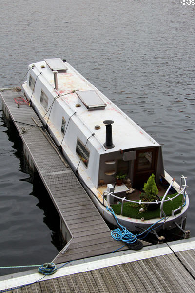 Canal boat docked at Royal Albert Docks. Liverpool, England.