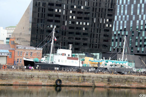 Great Western Railway Terminal & Edmund Gardner, Liverpool Pilot Cutter No 2 (1953) with black Discover complex beyond. Liverpool, England.