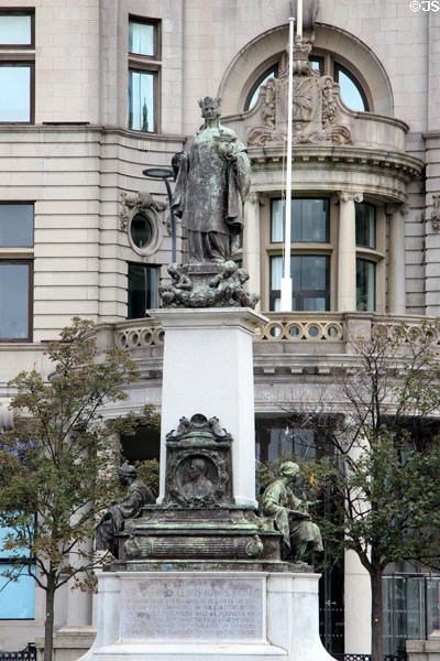 Memorial of Sir Alfred Lewis Jones noted for African colonial shipping under a statue of personification of Liverpool (1913) by George Frampton at Pier Head. Liverpool, England.