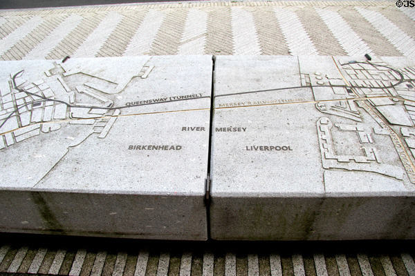 Bench before Ventilation Building for Queensway Tunnel carved with tunnel map. Liverpool, England.