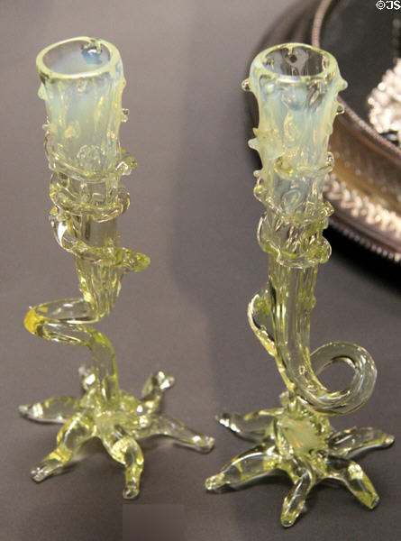 Vaseline glass (added uranium yields cloudy yellow-green) bud vases (c1880) from Stourbridge, West Midlands at Walker Art Gallery. Liverpool, England.