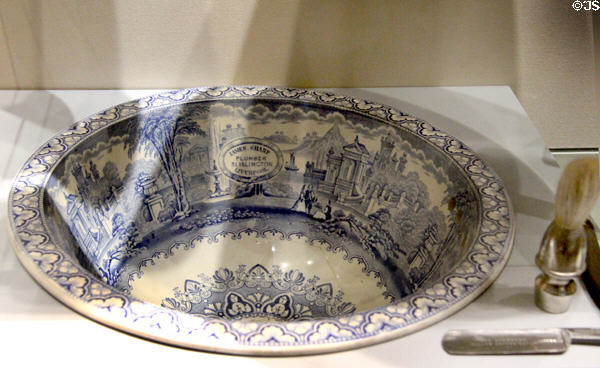 Earthenware washbasin (1835-40) prob. Staffordshire transfer printed with promotion for a Liverpool plumber at Walker Art Gallery. Liverpool, England.