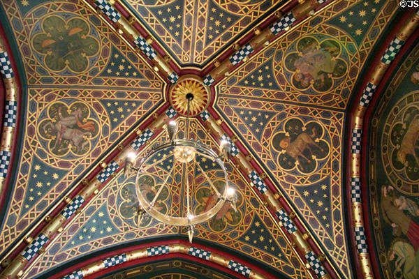 Ornate ceiling of Winter Smoking Room with 12 signs of the zodiac, painted by Fred Weekes at Cardiff Castle. Cardiff, Wales.