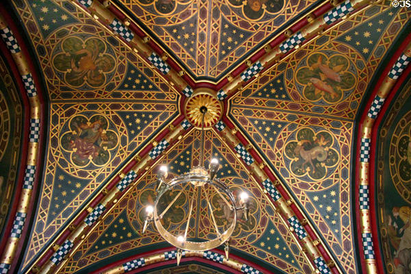 Ornate ceiling of Winter Smoking Room with 12 signs of the zodiac, painted by Fred Weekes at Cardiff Castle. Cardiff, Wales.