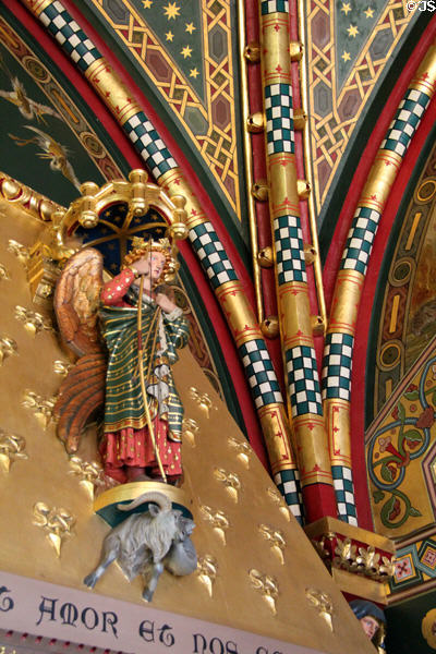 Crowning figure of Love on chimneypiece in Winter Smoking Room at Cardiff Castle. Cardiff, Wales.