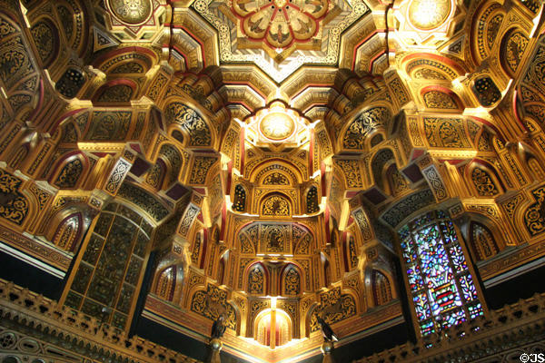 Islamic style, gilded ceiling with stained glass window insets in Arab Room at Cardiff Castle. Cardiff, Wales.