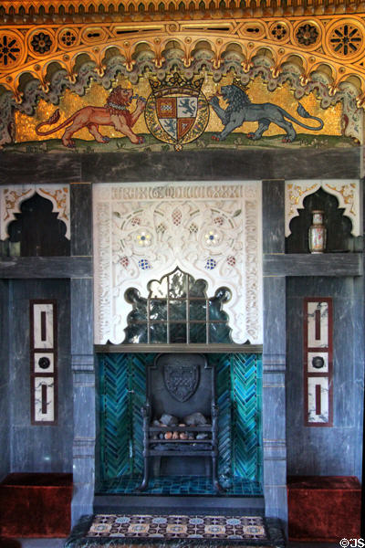 Lord Bute Coat-of-Arms & fireplace with ornately carved chimney piece in Arab Room at Cardiff Castle. Cardiff, Wales.