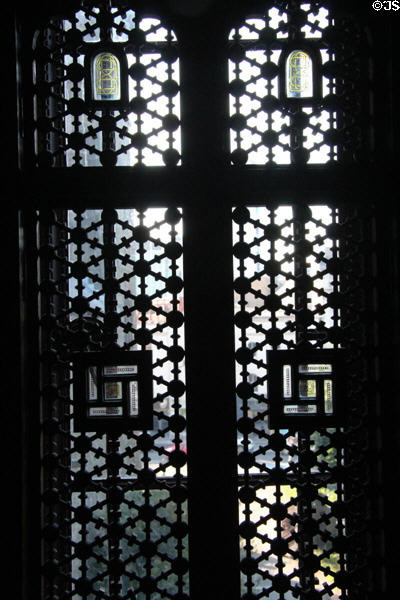 Mishrabaya style window shutters which allow one to look out but not be seen from outside in Arab Room at Cardiff Castle. Cardiff, Wales.