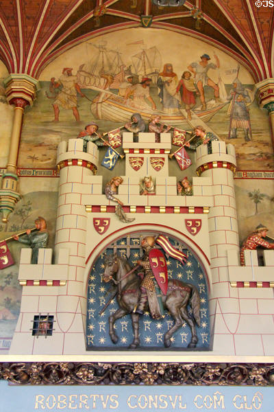 Chimneypiece sculpted by Thomas Nicholls & painted mural (1875) by Horatio Walter Lonsdale, close associate of William Burges, reflecting medieval history theme in Banqueting Hall at Cardiff Castle. Cardiff, Wales.