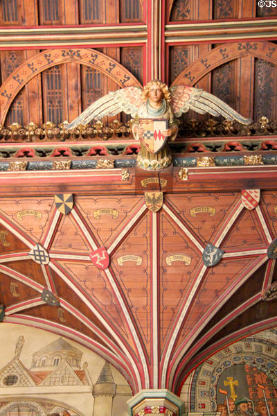 Carved angel holding shield In Banqueting Hall at Cardiff Castle. Cardiff, Wales.