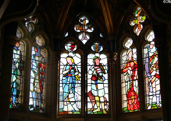 Stained glass windows, designed by William Burges, in Banqueting Hall at Cardiff Castle. Cardiff, Wales.