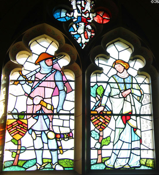 Stained glass windows, designed by William Burges, in Banqueting Hall at Cardiff Castle. Cardiff, Wales.