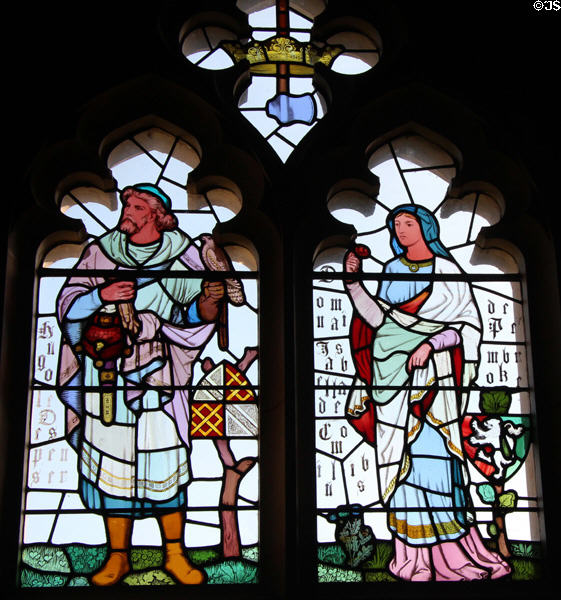 Stained glass windows, designed by William Burges, in Banqueting Hall at Cardiff Castle. Cardiff, Wales.