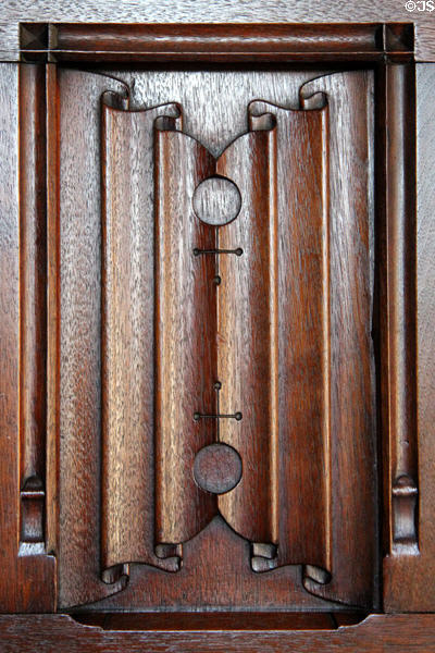 Wood panel carved to resemble elaborate folded material at Cardiff Castle. Cardiff, Wales.