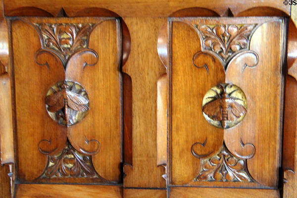 Detail of insect carving on wooden screen between bedroom & bathroom in Lord Bute's Bedroom at Cardiff Castle. Cardiff, Wales.