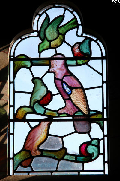 Stained glass window with bird theme in Lord Bute's bathroom at Cardiff Castle. Cardiff, Wales.