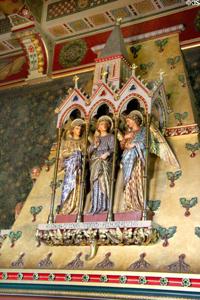 Chimneypiece showing three angels in Small Dining Room at Cardiff Castle. Cardiff, Wales.