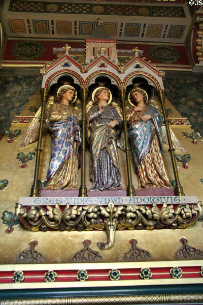 Chimneypiece showing three angels in Small Dining Room at Cardiff Castle. Cardiff, Wales.