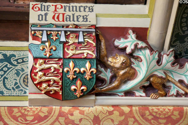 Sculpture of monkey holding Prince of Wales coat-of-arms in Library at Cardiff Castle. Cardiff, Wales.