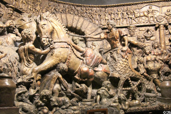 Roman Chariot section on Roman Invasion of South Wales sculpted mural (1983) by Frank Abraham at Cardiff Castle,. Cardiff, Wales.