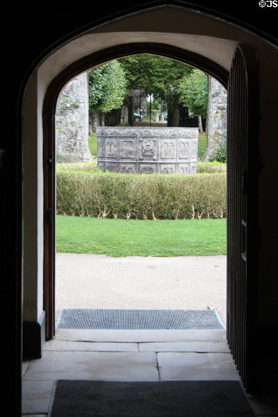 Ornate lead cistern at St Fagans Castle as viewed through castle entrance. Cardiff, Wales.