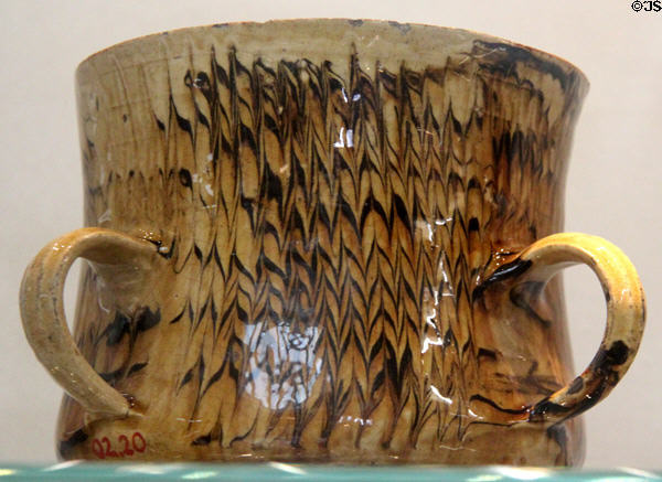 Slipware Tyg (a large ceramic drinking cup) (c1680-1700) prob. Staffordshire at National Museum of Wales. Cardiff, Wales.