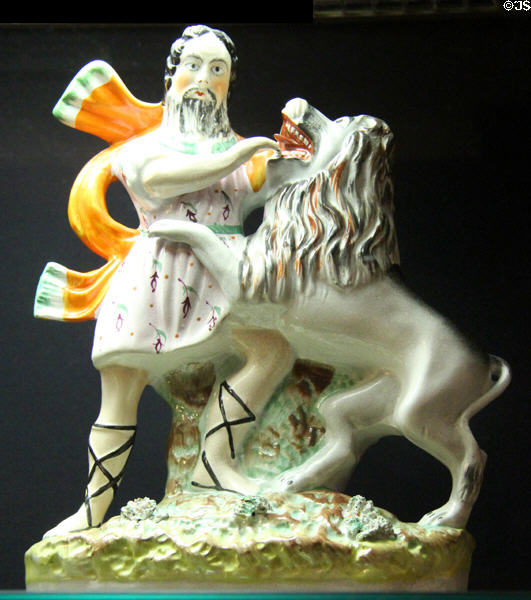 Painted earthenware figurine, Samson & the Lion (c1840-90), Staffordshire at National Museum of Wales. Cardiff, Wales.