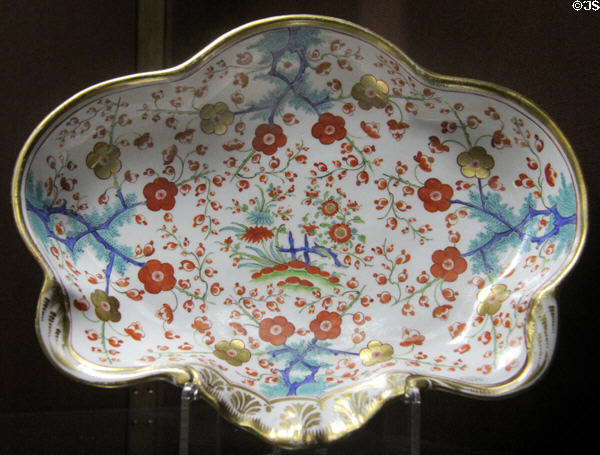 Hybrid-paste porcelain scalloped-shaped dish with floral design (1800-10) made by Chamberlain of Worcester at National Museum of Wales. Cardiff, Wales.