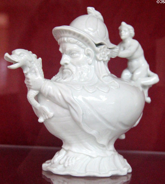Porcelain teapot in shape of man holding dolphin spout (c1720) by Meissen Porcelain Manuf. of Germany at National Museum of Wales. Cardiff, Wales.