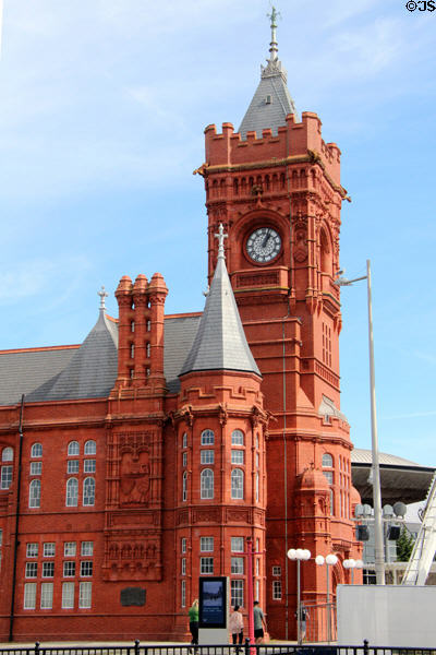 Ornate clock tower, chimneys & terracotta panels on the Pierhead building at Cardiff Bay. Cardiff, Wales.