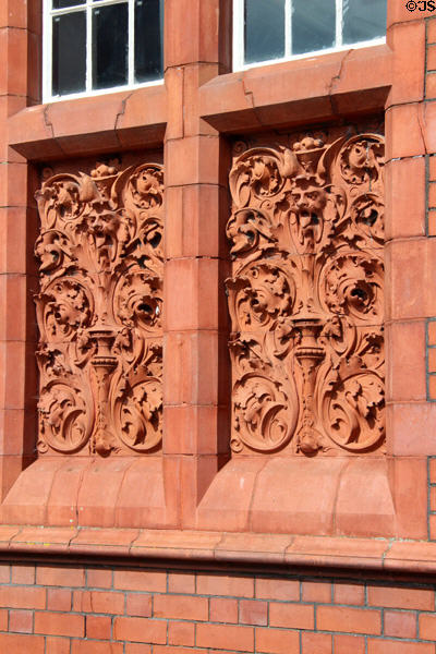 Elaborately carved terracotta panels on facade of the Pierhead building at Cardiff Bay. Cardiff, Wales.