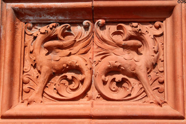 Terracotta panel carved with dragons on the Pierhead building at Cardiff Bay. Cardiff, Wales.