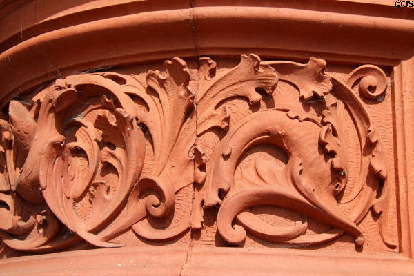 Detail of carved terracotta panel on the Pierhead building at Cardiff Bay. Cardiff, Wales.