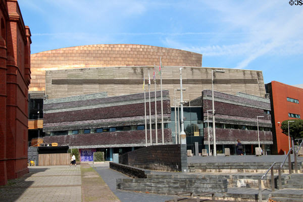 Bronze colored roof & multi-colored Welsh slate walls at Wales Millennium Centre at Cardiff Bay. Cardiff, Wales.