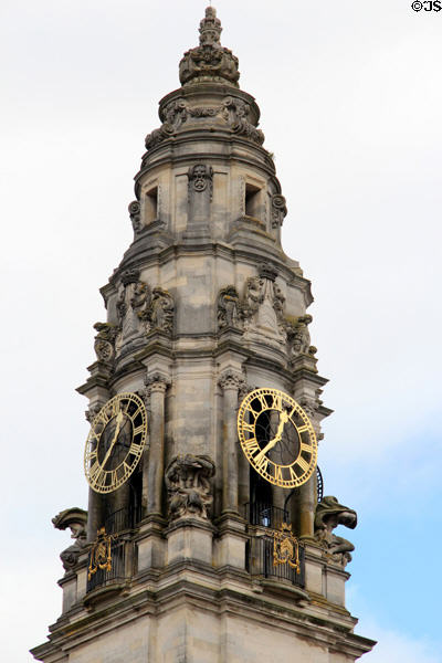 Detail of highest section of clock tower (1906) with gilded dials on Cardiff City Hall. Cardiff, Wales.