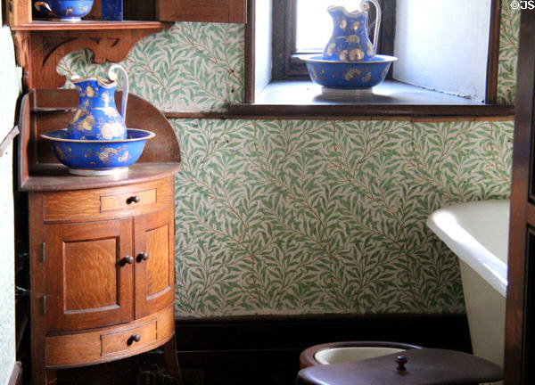 Bathroom, with William Morris wall paper, called Willow Bough (1887) serving the Keep Bedrooms at Penrhyn Castle. Bangor, Wales.