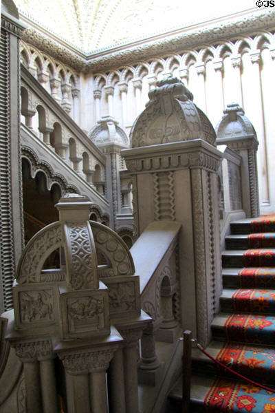 Grey stone Grand Staircase with many carvings at Penrhyn Castle. Bangor, Wales.