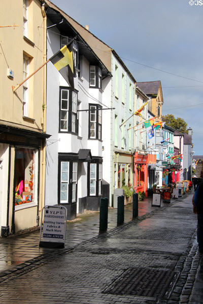 Shops & flags along Palace St. Caernarfon, Wales.