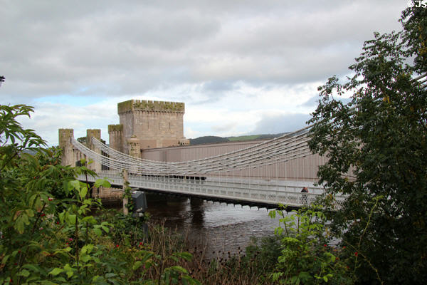 Telford's suspension bridge & Stephenson's tubular railway bridge side by side. Conwy, Wales.