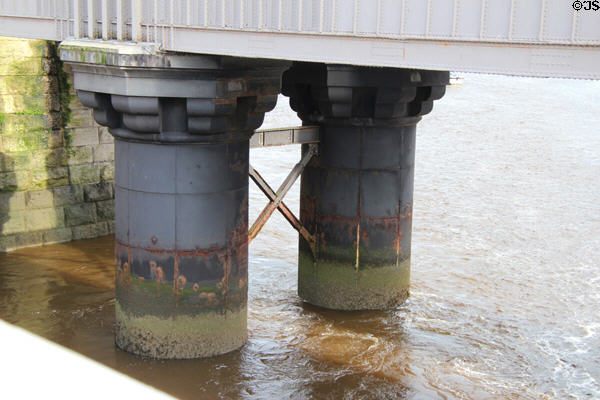 Pillars supporting Stephenson's railway bridge over Conwy River. Conwy, Wales.